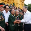 El presidente To Lam y los delegados. (Fuente: VNA)