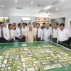 El secretario general del Partido Comunista de Vietnam Nguyen Phu Trong visita el Parque Industrial Vietnam-Singapur I (VSIP I) en la provincia de Binh Duong, el 13 de abril de 2013. (Foto: VNA)