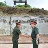 El viceministro vietnamita de Defensa, Hoang Xuan Chien, y su homólogo laosiano Vongkham Phommakone. (Fuente: qdnd.vn)