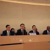 Заместитель министра иностранных дел До Хунг Вьет (третий слева) выступает на сессии УПО по принятию национального доклада Вьетнама (Фото: ВИA)