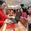 В ювелирном магазине, принадлежащем золотой компании Bao Tin Minh Hai (Фото: ВИA)