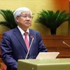 Председатель ЦК Отечественного фронта Вьетнама (ОФВ) До Ван Чиен выступает с докладом на седьмой сессии НС. (Фото: ВИA)