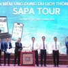 Представители агентств на церемонии запуска приложения Sapa Tour для продвижения туризма в курортном городе Сапа в северной провинции Лаокай. (Фото: nhandan.vn) 