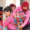 Уход за здоровьем матери и ребенка - Свидетельство обеспечения прав человека во Вьетнаме