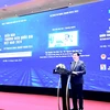 Заместитель министра Нгуен Шинь Нят Тан выступает на Форуме национального бренда, организованном Министерством промышленности и торговли 16 апреля в Ханое. (Фото: Дык Зюи/Vietnam+)