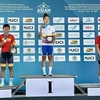 Нгуен Тхи Тхат (слева) на подиуме, завоевавшая серебро на 43-м чемпионате Азии по шоссейному велоспорту 11 июня в Алматы, Казахстан (Источник: vietnamnews.vn) 