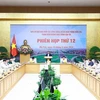 Премьер-министр Фам Минь Тьинь выступает на 12-м заседании Государственного руководящего комитета по национальным ключевым транспортным проектам в Ханое 14 июня (Фото: ВИA)