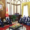 Президент Вьетнама То Лам и посол Индии во Вьетнаме Сандип Арья на встрече в Ханое 26 июня. (Фото: ВИA)