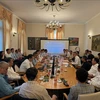 Встреча министра науки и технологий Хюинь Тхань Дат с учеными и представителями интеллигенции вьетнамского происхождения в Германии 26 июня. (Фото: ВИA)