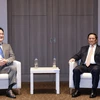 Премьер-министр Фам Минь Тьинь (справа) принимает председателя Samsung Electronics Ли Чжэ Ёна в Сеуле 2 июля (Фото: ВИA)