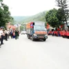 归宿在老挝牺牲的87名越南志愿军和专家的遗骸回国欢迎仪式。图自越通社