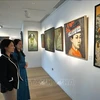 La galería de arte vietnamita Thang Long presenta en la casa de subastas Bonhams una exposición titulada "Una mirada a Vietnam" (Fuente:VNA)