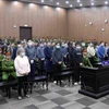 Les accusés écoutent leur verdict dans le cadre du procès de première instance de l’affaire de Viêt A, le 12 janvier 2024. Photo : VNA