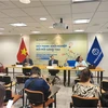 Les experts de la BM lors de la cérémonie de publication du rapport. Photo: VietnamPlus