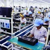Dans l’usine de production de téléphones portables de Samsung Vietnam à Bac Ninh (Nord). Photo : VNA