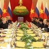 Le secrétaire général Nguyên Phu Trong s’entretient avec le président russe Vladimir Poutine