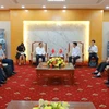 Des représentants du Comité populaire de la province de Thai Nguyên et du Comité nationale des affaires ethniques de Chine lors de la séance de travail. Photo : baothainguyen.vn