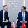 Le Premier ministre Pham Minh Chinh (à droite) rencontre le président polonais Andrzej Duda, en marge de la 15e réunion annuelle des nouveaux champions du WEF. Photo : VNA