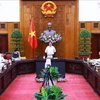 Le Premier ministre Pham Minh Chinh s’exprime lors de la réunion, à Hanoi, le 22 juillet. Photo: VNA