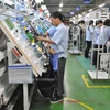 Usine de production de câbles électriques pour voitures et motos dans la compagnie Sumi Vietnam, à capital japonais, basée dans le parc industriel de Thanh Liêm, province de Hà Nam. Photo : CTV