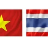 Drapeaux du Vietnam et de la Thaïlande. Photo: VNA