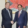 Le Premier ministre Pham Minh Chinh (à droite) rencontre son homologue japonais Shigeru Ishiba, à Vientiane, au Laos, le 11 octobre. Photo : VNA