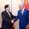 Le Premier ministre Pham Minh Chinh (à gauche) et le président du Sénat de la République dominicaine Ricardo de los Santos Polanco. Photo : ANV