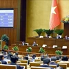 L’Assemblée nationale vote pour adopter la la Loi sur la planification urbaine et rurale, à Hanoi, le 26 novembre. Photo : VNA