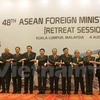 Deputy PM and Foreign Minister Pham Binh Minh (5th, L) at the AMM 48. (Photo: Vietnamplus)