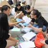 Student group recycles paper for notebooks 