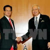 Ties with Malaysia, Singapore thrive 