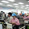 At Samsung Electronics factory in Thai Nguyen Province, Vietnam. (Photo: VNA)