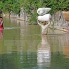  Myanmar: Thousands evacuated as floods rage