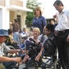 Wheelchairs given to the disabled in Lam Dong