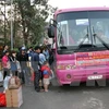 20,000 poor workers offered free home-coming buses in Tet