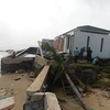 Big waves destroy beach in central province