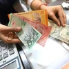 Malaysia to apply new exchange rate