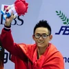 Nhat wins gold, sets national record in swimming