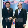 Vietnamese, Lao PMs declare to ratchet up ties 