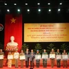 Laos honours Vietnamese voluntary soldiers, experts