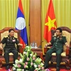 Vietnam, Laos tank-artillery forces boost training cooperation