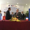  FDA, EDF IN sign pact in Hanoi