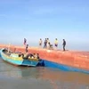  Fishing boat sinks, 13 rescued, four still missing 