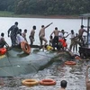 At least 14 dead after boat sinks off Malaysia