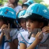 Safe helmet use spotlighted in Hanoi 