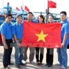 National flags presented to fishermen in Phu Quy island 