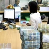 Vietnamese banks enhanced transparency in 2015: Moody's 