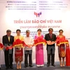 Vietnamese press exhibition underway in Laos
