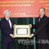 Ho Chi Minh National Politics Academy leaders honoured by Laos