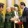 State leader hails contributions by former volunteers in Laos